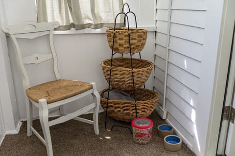 🐾 Thoughtful pet-friendly corner with treats and essentials for furry guests 🐕✨
