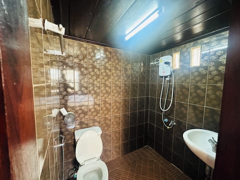 Standard Double Room | Bathroom | Shower, towels, soap, toilet paper