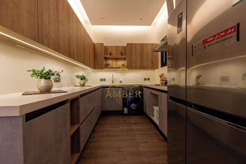 Luxury Apartment A14 | Private kitchen | Full-size fridge, microwave, oven, cookware/dishes/utensils