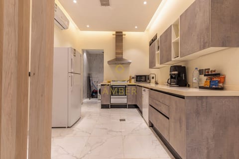 Luxury Apartment A9 | Private kitchen | Full-size fridge, microwave, oven, cookware/dishes/utensils