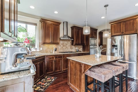 Kitchen has all utensils, Cooking sets, Mixers, Blender, and so on