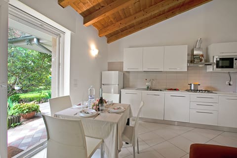 Family House, 2 Bedrooms (Il Giardino di Sara) | Private kitchen | Fridge, microwave, stovetop, dishwasher