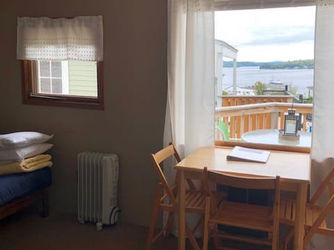Standard Studio, 1 King Bed, Lake View (Cottage 10 or 11) | In-room dining