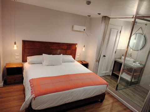 Deluxe Room, Courtyard View | In-room safe, desk, laptop workspace, iron/ironing board