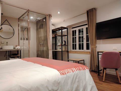 Deluxe Room, Courtyard View | In-room safe, desk, laptop workspace, iron/ironing board