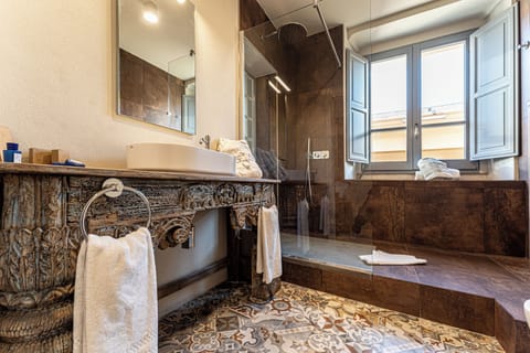 Classic Suite | Bathroom | Designer toiletries, hair dryer, bathrobes, slippers