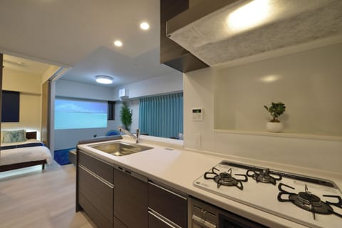 Apartment | Private kitchen | Fridge, microwave, stovetop, rice cooker