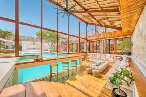 Enjoy your cocktails by the pool with the luxury of your living room