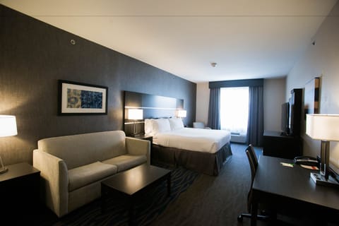 Suite, 1 King Bed | Premium bedding, down comforters, pillowtop beds, individually decorated