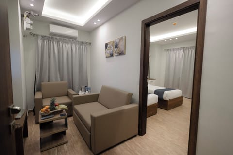 City Studio Suite, 1 Bedroom, Balcony | In-room safe, soundproofing, iron/ironing board, free WiFi