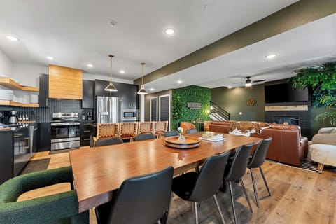 Gather around the custom-built dining table with plenty of seating for the whole crew—ideal for shared meals and lasting memories.