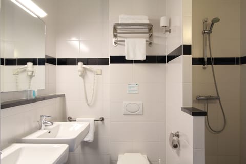 Shower, free toiletries, hair dryer, towels