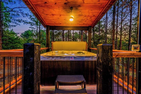 Slip into the private hot tub and let your stress melt away.