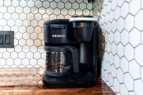 Start your mornings with a fresh brew using our Keurig coffee maker—pods included!