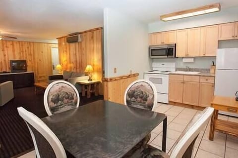 This townhome features a full kitchen, dining area, and living room.