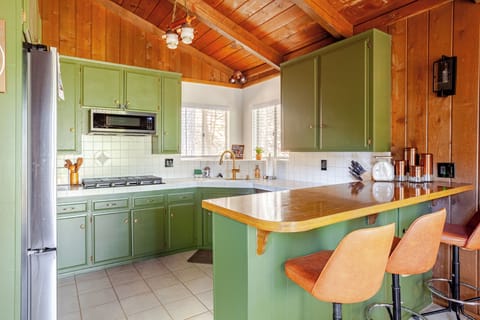 Kitchen includes a pots and pans set, plenty of cooking utensils, bowls & more.