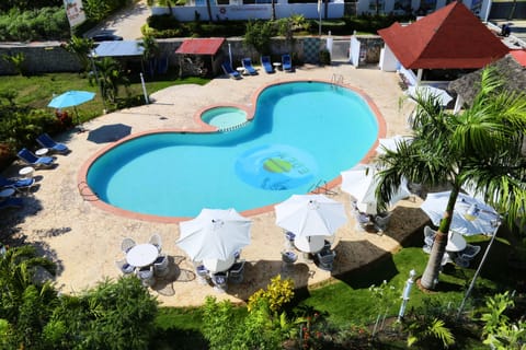 Outdoor pool, open 7:30 AM to 6:00 PM, pool umbrellas, sun loungers