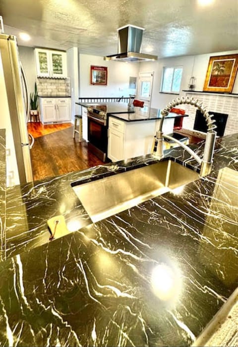 Farm Sink, Open Kitchen, Bar Stools, Full Silverware and Plate Set