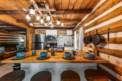 Entering the cabin, you immediately see the charm of the kitchen.