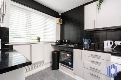 Kitchen. Fully equipped with cooking equipment perfect for families. Appliances such as fridge freezer, microwave, cooker, oven, dishwasher Toaster are free and available for your use.