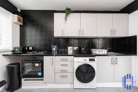 Kitchen. Fully equipped with cooking equipment perfect for families. Appliances such as fridge freezer, microwave, cooker, oven, dishwasher Toaster are free and available for your use.