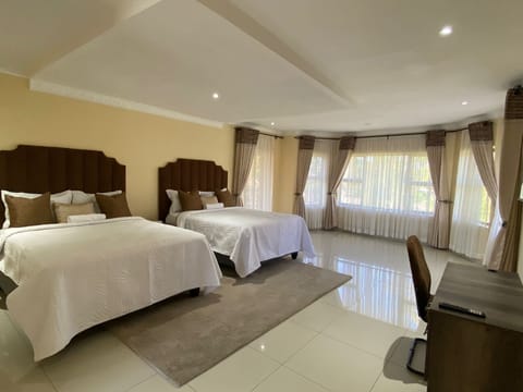 Deluxe Double or Twin Room, Garden View | Hypo-allergenic bedding, pillowtop beds, individually decorated, desk