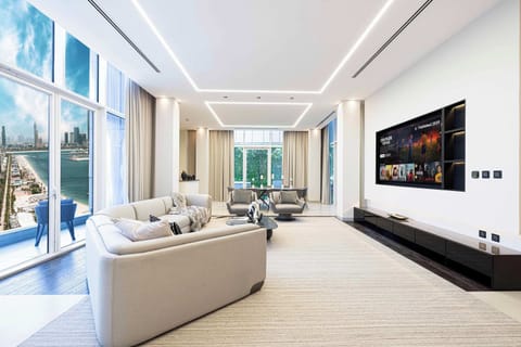 Beautiful open plan living area with panoramic views, balcony, bar and huge smart TV