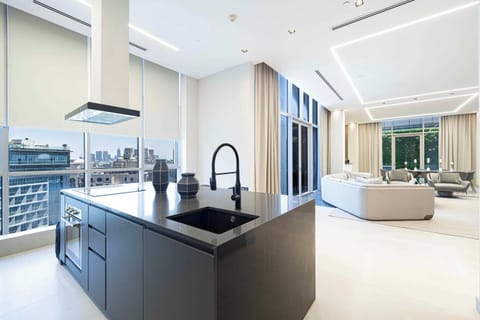 Fully equipped kitchen with panoramic views of West Beach and the Palm