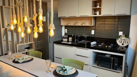 Deluxe Apartment | Private kitchen | Full-size fridge, microwave, oven, cookware/dishes/utensils