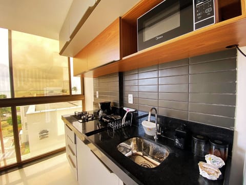 Deluxe Apartment | Private kitchen | Full-size fridge, microwave, coffee grinder, cookware/dishes/utensils