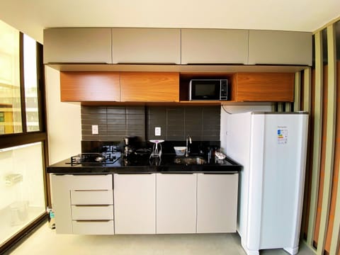 Deluxe Apartment | Private kitchen | Full-size fridge, microwave, coffee grinder, cookware/dishes/utensils