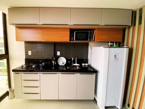 Deluxe Apartment | Private kitchen | Full-size fridge, microwave, coffee grinder, cookware/dishes/utensils