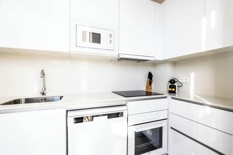 Premium Penthouse | Private kitchen | Full-size fridge, microwave, oven, stovetop