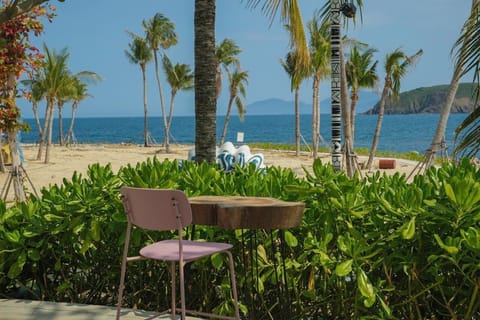 Private beach, white sand, sun loungers, beach umbrellas