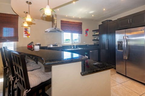 Condo, 3 Bedrooms | Private kitchen | Fridge, oven, coffee/tea maker