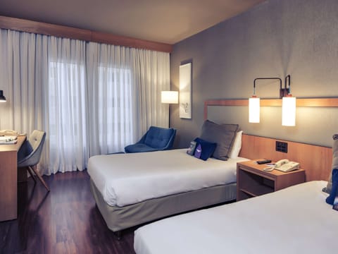 Standard Room, Multiple Beds | Minibar, in-room safe, desk, blackout drapes