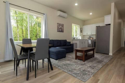 Light and bright living space with forest views. 