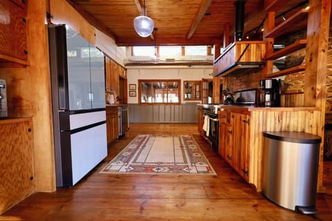 Pantry full of kitchen appliances blenders, air fryers, instant pot, mixers...