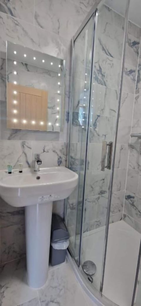 Rainfall showerhead, free toiletries, hair dryer, towels