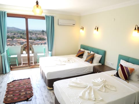 Family Room, Balcony, City View | In-room safe, desk, free WiFi, bed sheets