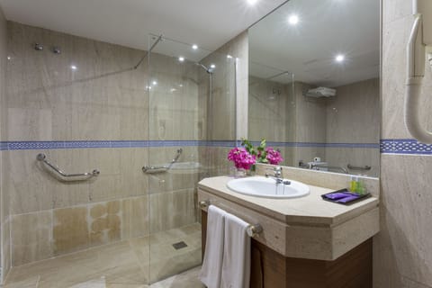 Bathtub, deep soaking tub, eco-friendly toiletries, hair dryer