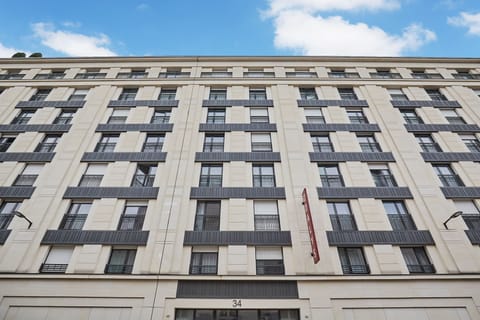 Modern multi-story residence with clean lines and a timeless Parisian flair.