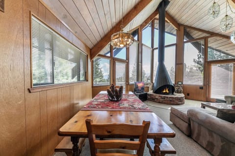 Dining room: 10-person wood dining table, adjacent to kitchen and living room