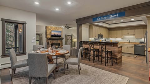 Guest apartment on the middle (3rd) level with dining area, kitchen, and breakfast bar