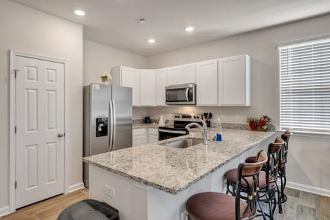 Townhome, 3 Bedrooms | Private kitchen | Fridge, oven, coffee/tea maker