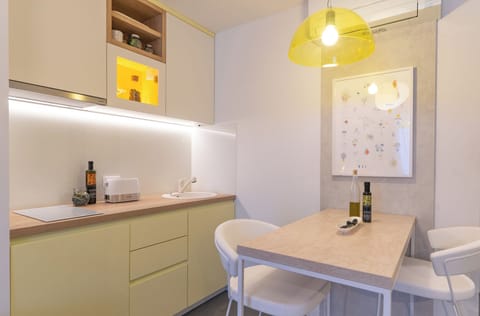 City Studio, Private Bathroom, Courtyard Area | Private kitchen | Fridge, microwave, stovetop, toaster