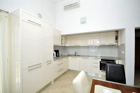 Apartment (Two Bedroom Apartment with Sea View B) | Private kitchen | Fridge