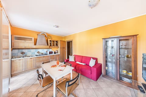 Apartment | Living area | 35-inch flat-screen TV with digital channels