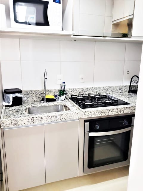 Design Apartment | Private kitchen | Full-size fridge, microwave, cookware/dishes/utensils, freezer