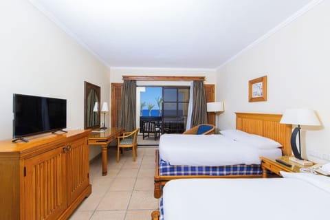 Junior Double or Twin Room, Partial Sea View | In-room safe, desk